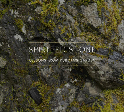 Book cover. Moss-covered stones with Spirited Stone superimposed.